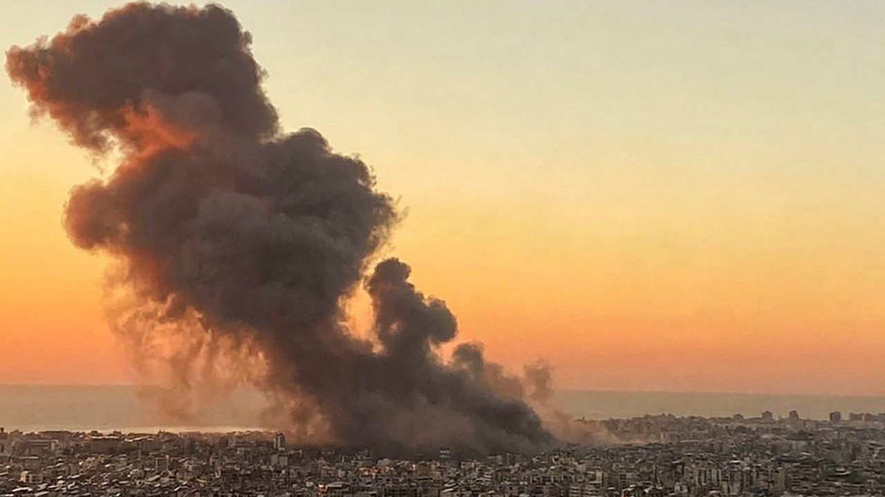 Smoke rises above Beirut's southern suburbs during an Israeli strike on September 27, 2024. Israeli bombing of Iran-backed Hezbollah strongholds around Lebanon has killed hundreds of people this week, while the militant group has retaliated with rocket barrages. (Photo by AFP)