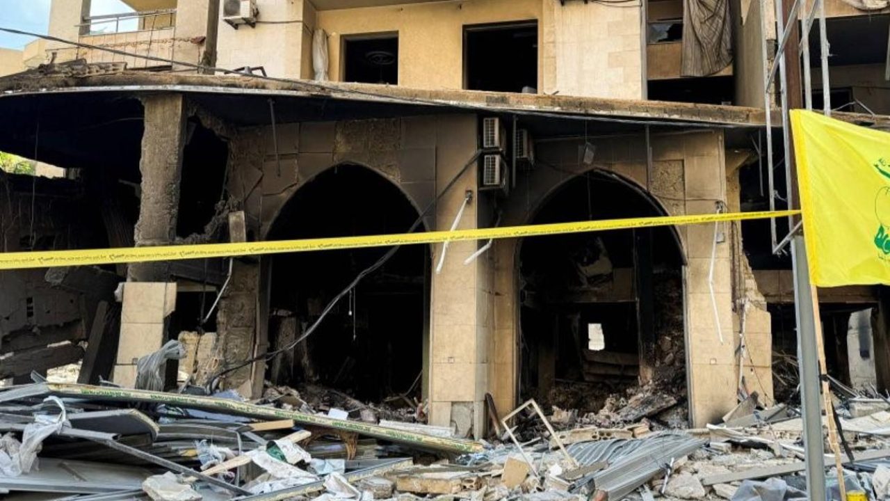 destructions dahye and Hezbollah flag hizbollah