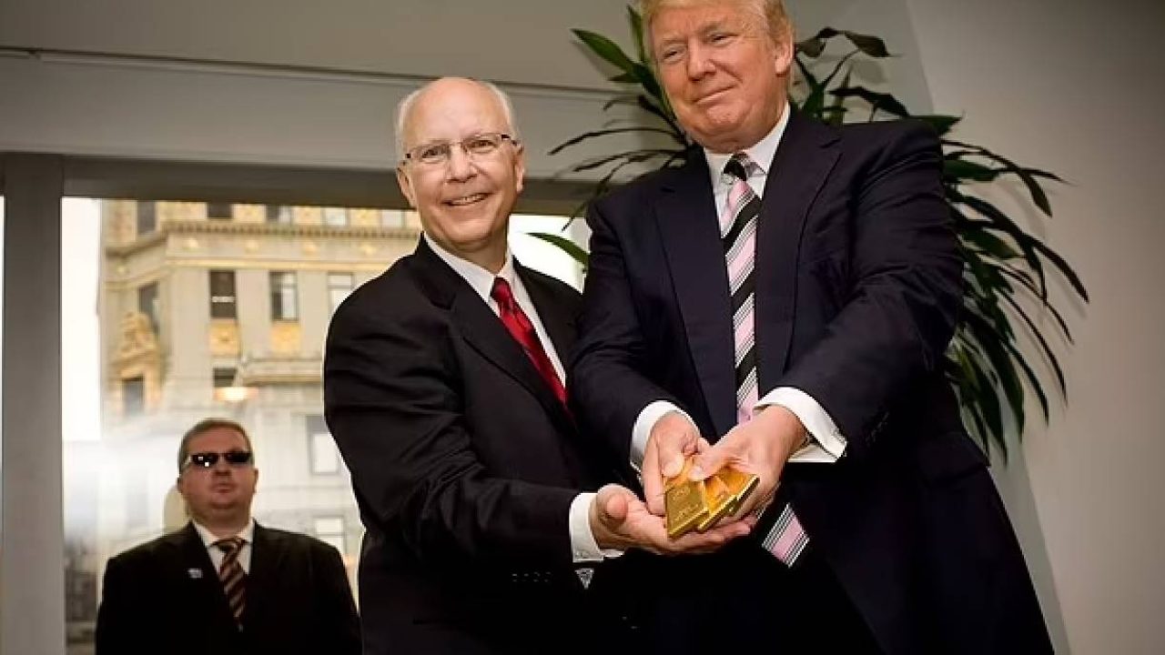 donald trump holding gold bars