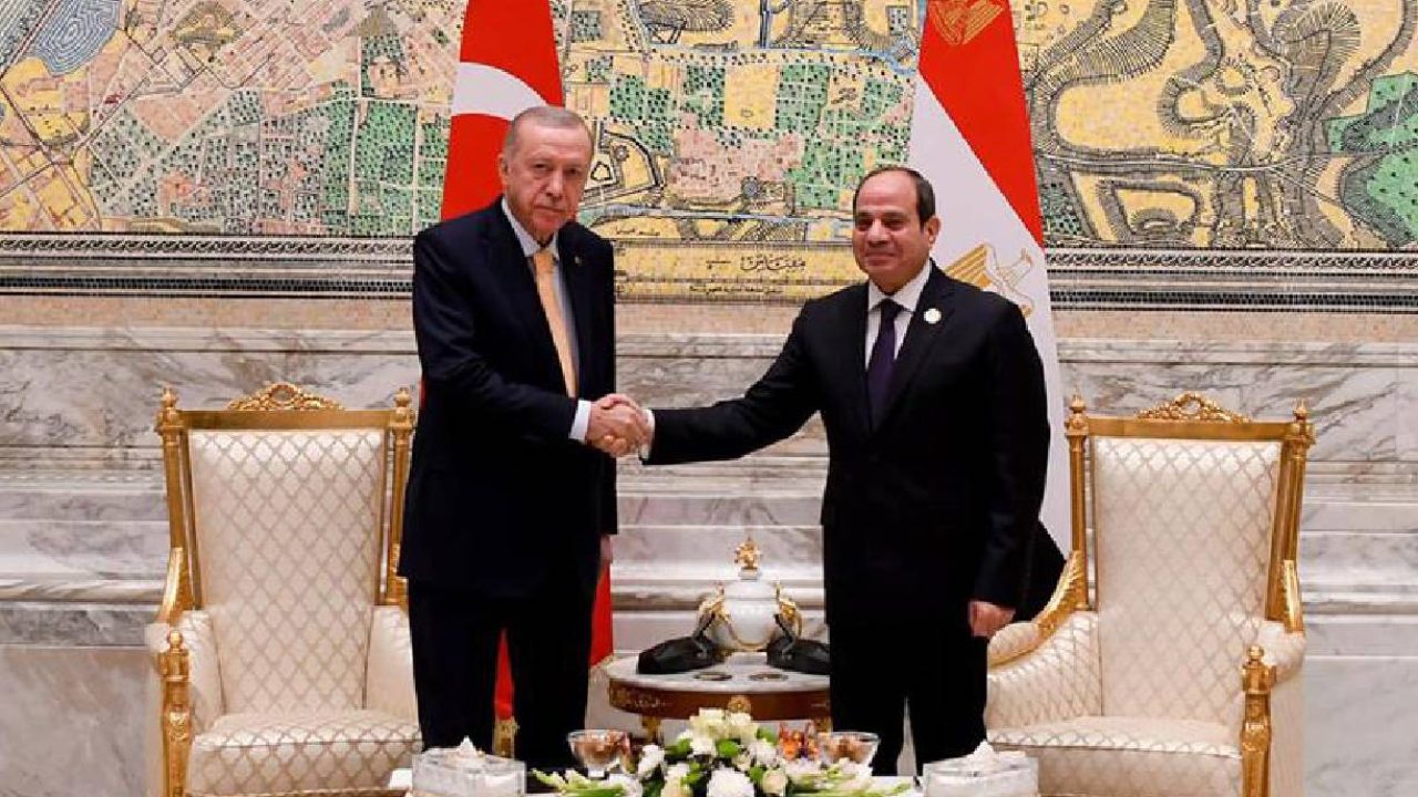 erdogan and sisi with flags