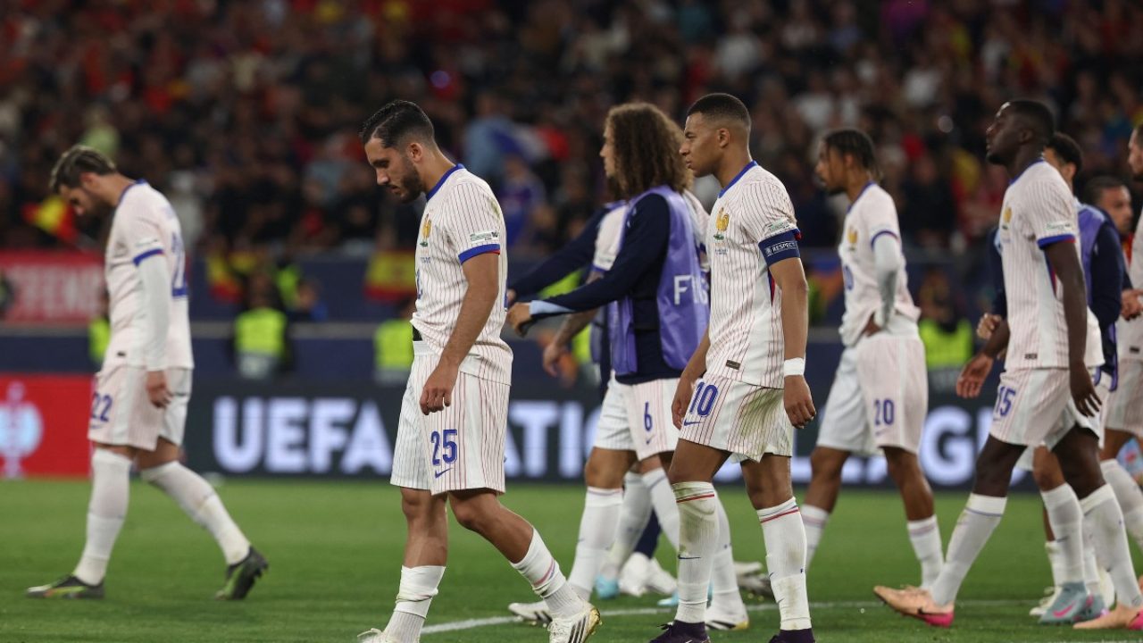 France's forward #10 Kylian Mbappe (C) and his teammates react after the UEFA Nations League semi-final football match between Spain and France in Stuttgart, southwestern Germany, on June 5, 2025. (Photo by FRANCK FIFE / AFP)