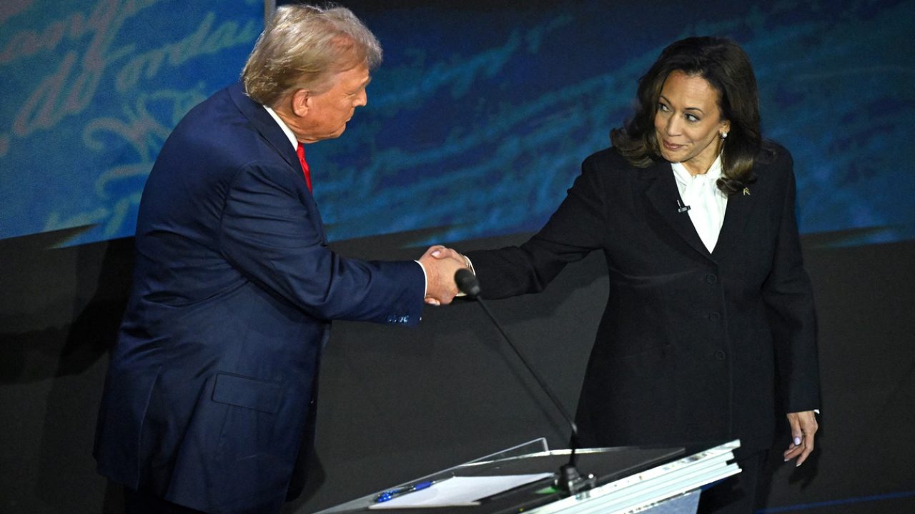 harris and trump shaking hands (1)