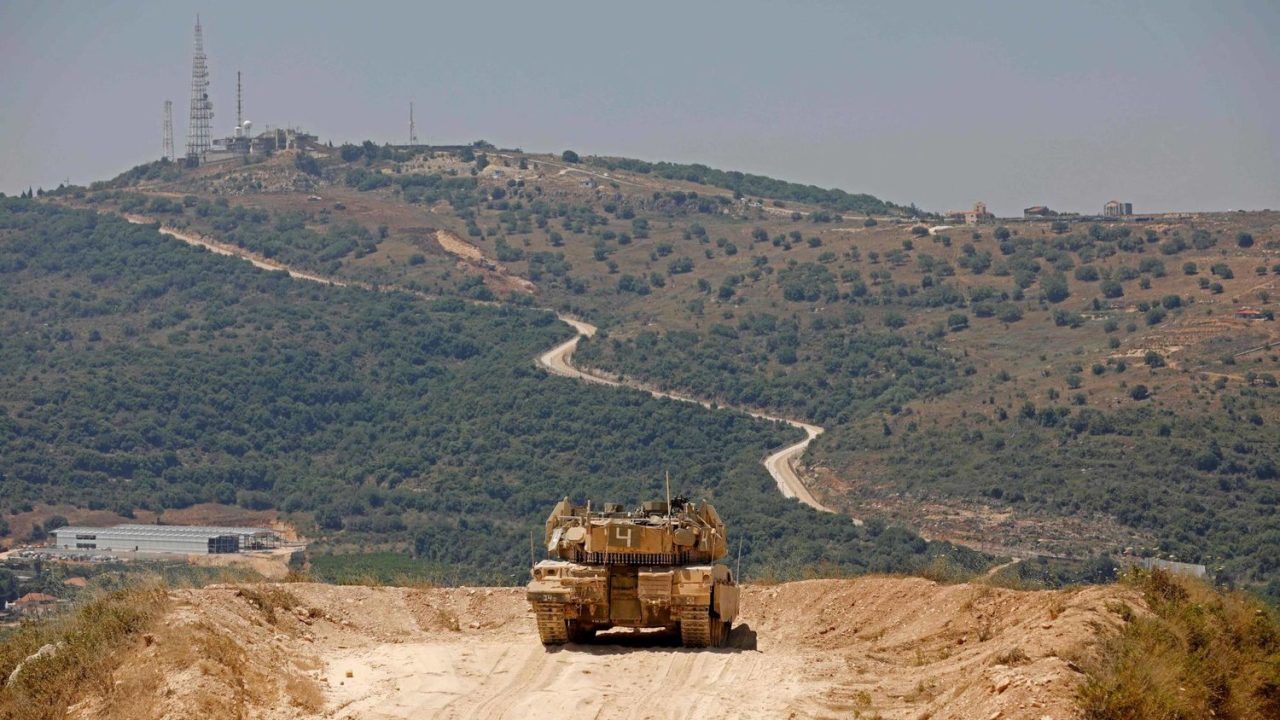 A Merkava battle tank is positioned on the northern border with Lebanon near the Israeli Kibbutz of Misgav Am, on June 27, 2023. (Photo by JALAA MAREY / AFP)