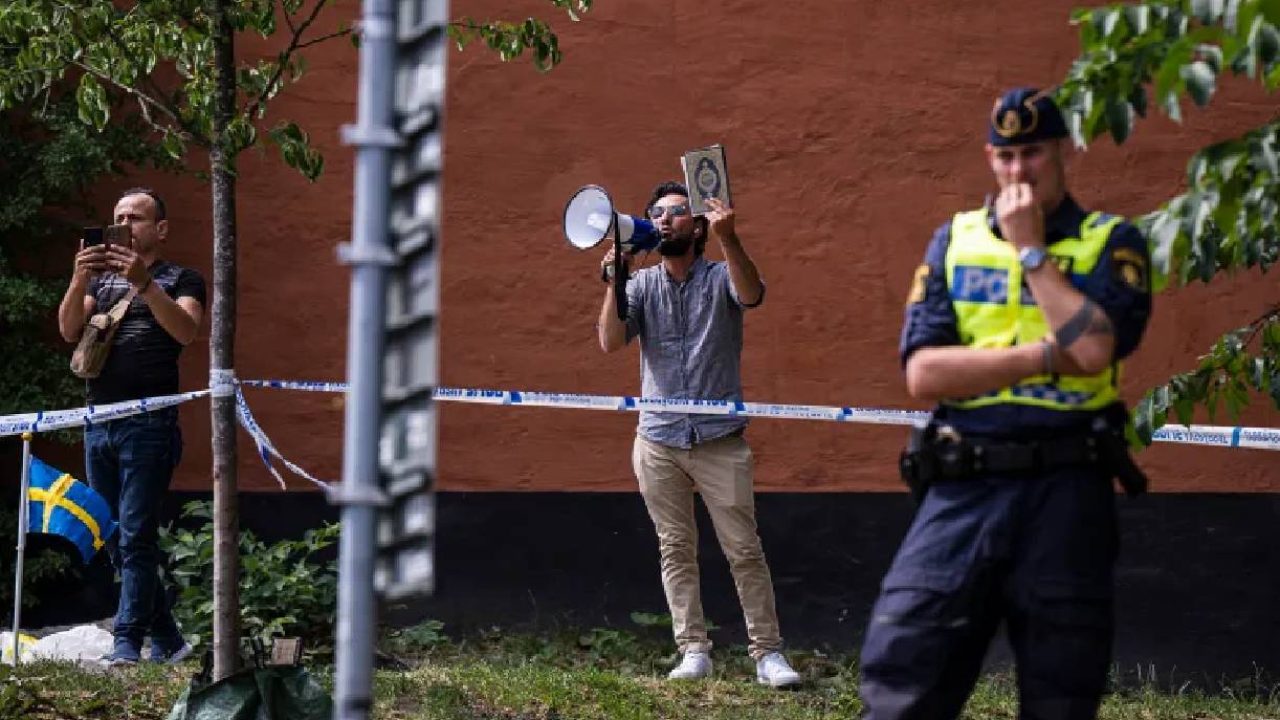 iraqi holding quran in sweden