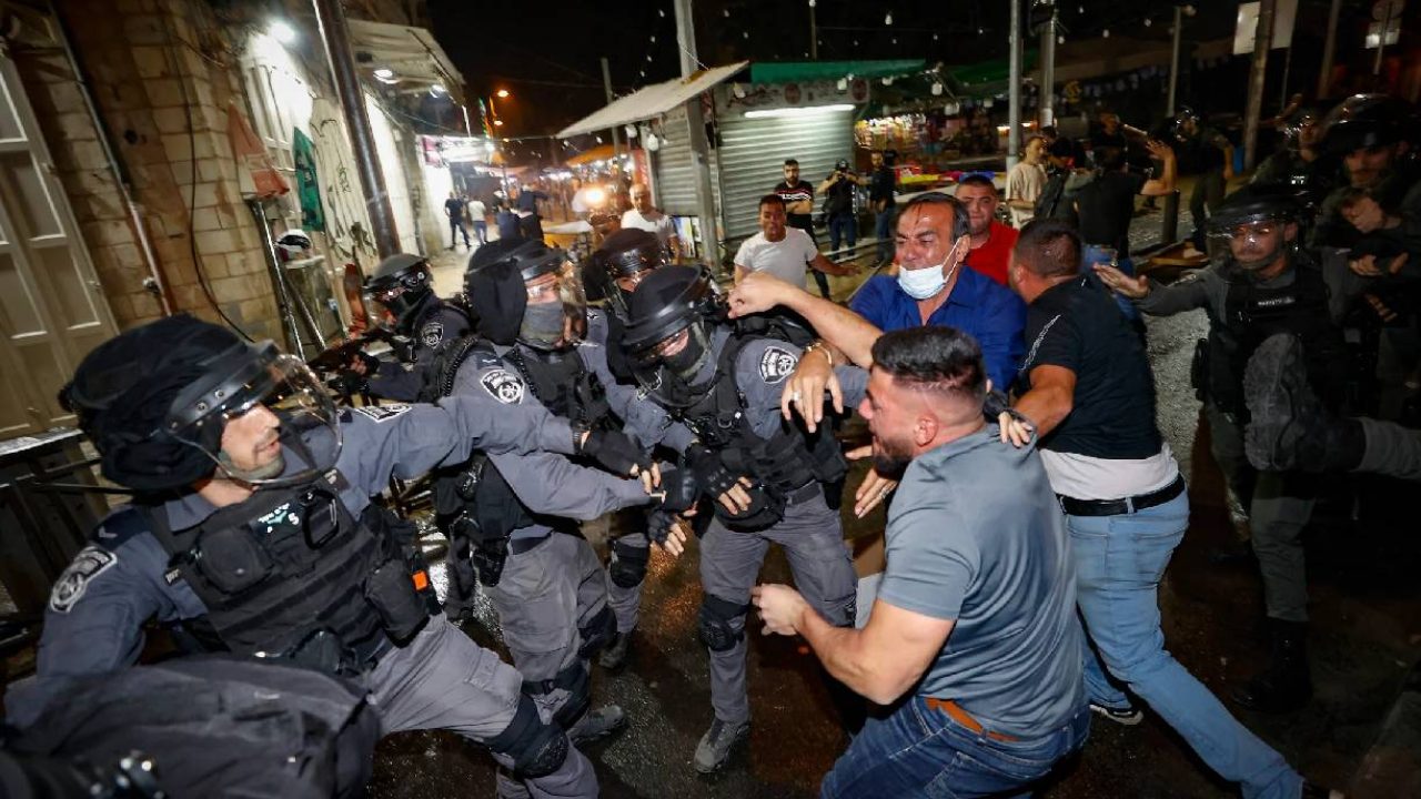 israeli cops hitting protesters