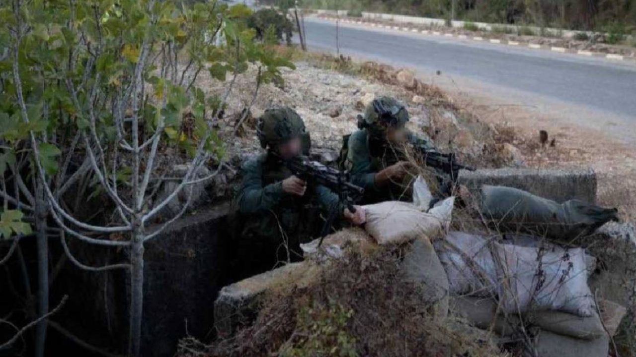 israeli soldiers firing weapons