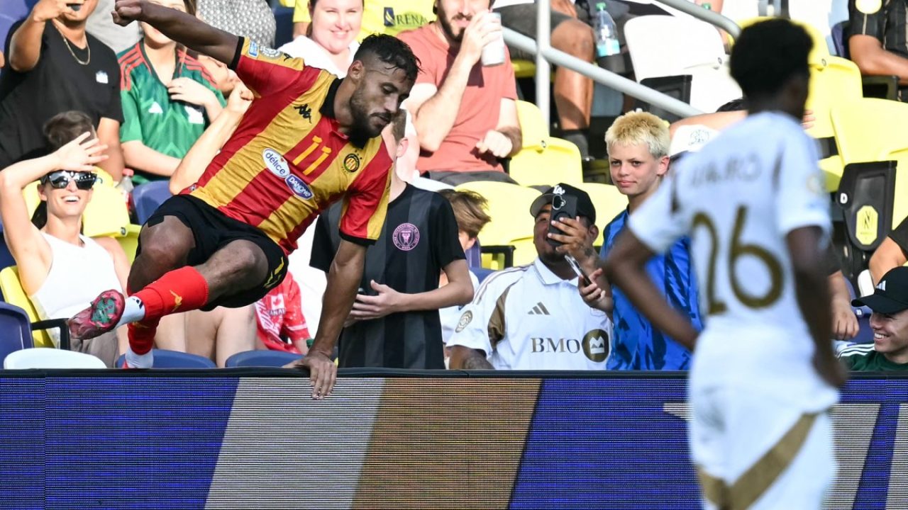 Esperance's Algerian midfielder #11 Youcef Belaili (L) celebrates scoring his team's first goal during the FIFA Club World Cup 2025 Group D football match between US Los Angeles FC and Tunis' Esperance Sportive de Tunis at the Geodis Park stadium in Nashville on June 20, 2025. (Photo by Paul ELLIS / AFP)