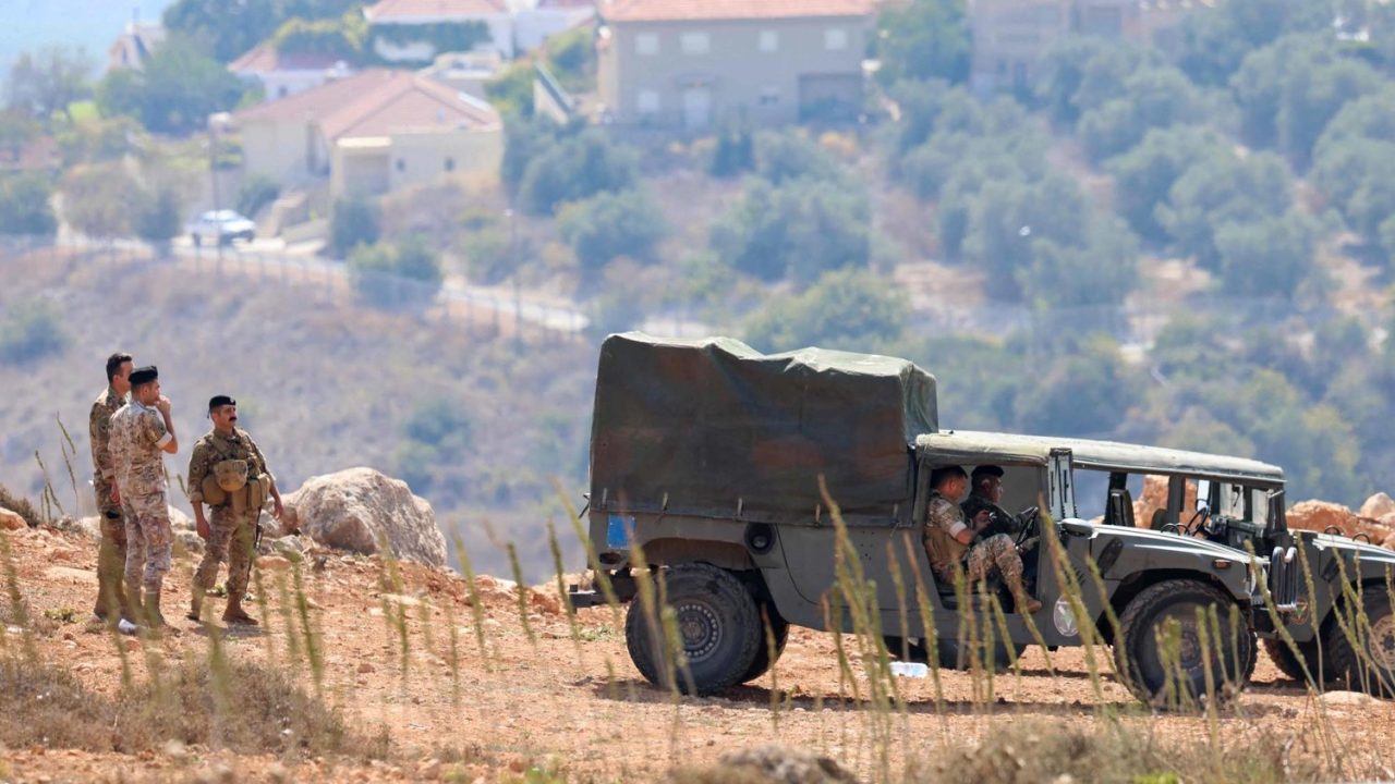 Lebanese army soldiers patrol the border area between Lebanon and Israel on Hamames hill in the Khiyam area of southern Lebanon, on October 13, 2023. Israel shelled a border region in southern Lebanon, two Lebanese security sources said, after a blast occurred on the border fence, according to the Israeli army. (Photo by Joseph EID / AFP)