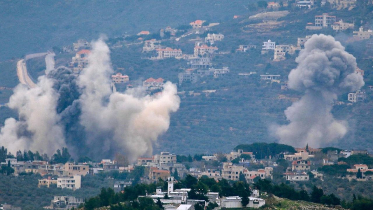 TOPSHOT - Smoke billows after Israeli bombardment over Lebanon's southern town of Kfar Kila near the border with Israel on December 21, 2023, amid ongoing cross-border tensions as fighting continues between Israel and Hamas militants in Gaza. (Photo by AFP)