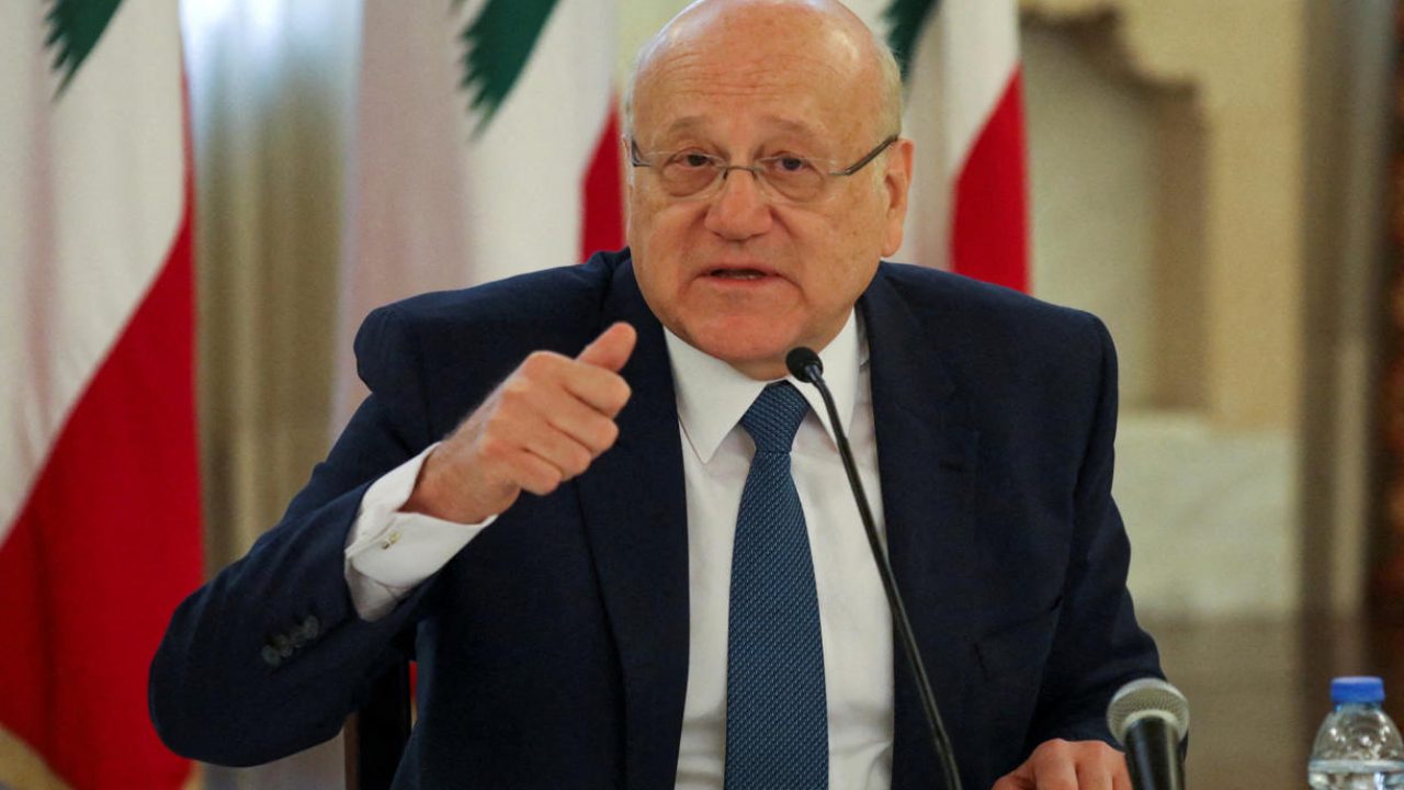 FILE PHOTO: Lebanese Prime Minister Najib Mikati gestures during a news conference at the government palace in Beirut, Lebanon, December 28, 2021. REUTERS/Mohamed Azakir