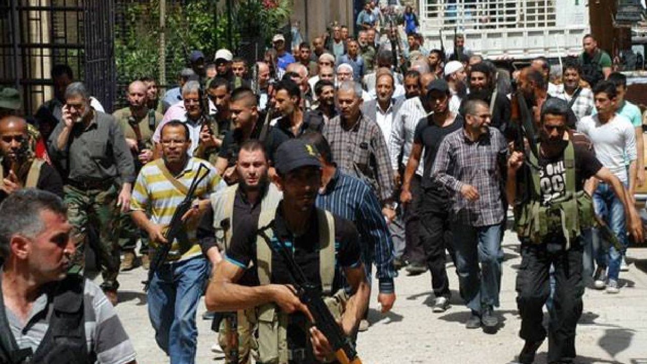 palestinian armed men in camp