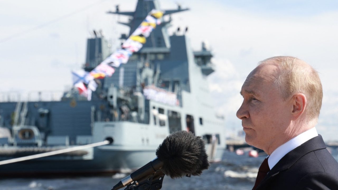 (FILES) In this pool photograph distributed by the Russian state agency Sputnik, Russia's President Vladimir Putin attends the main naval parade marking the Russian Navy Day in Saint Petersburg on July 28, 2024. Russia cancelled a major annual navy parade on July 27, 2025 for "security reasons", the Kremlin said, without specifying the threat or concern. (Photo by Vyacheslav PROKOFYEV / POOL / AFP)