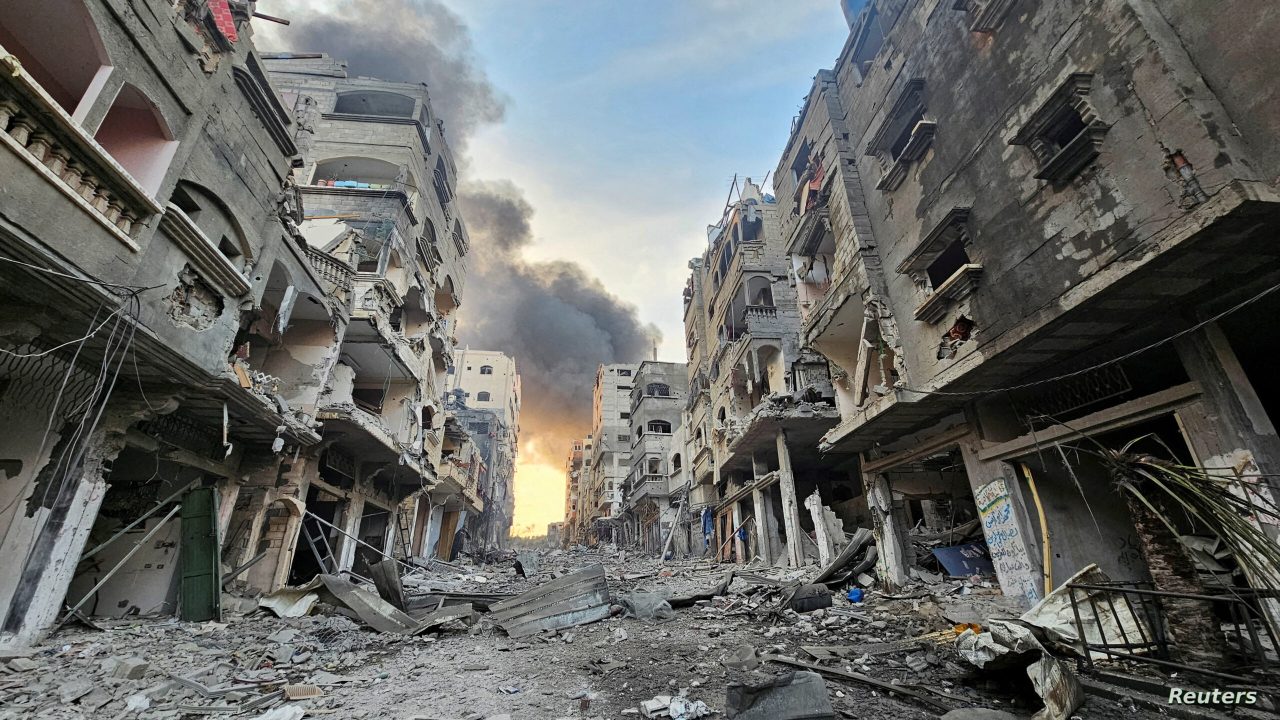 FILE PHOTO: A view shows houses and buildings destroyed in Israeli strikes, in Jabalia in the northern Gaza Strip, October 11, 2023. REUTERS/Anas al-Shareef/File Photo