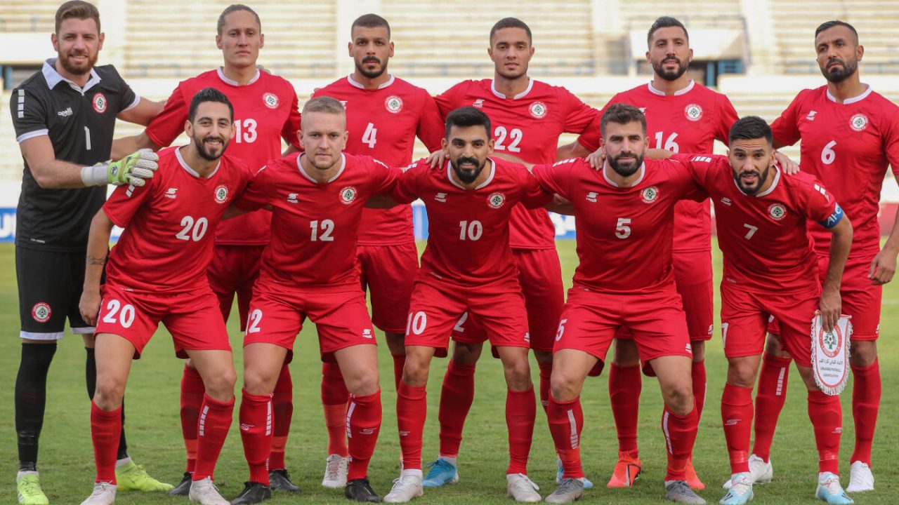 Lebanon's starting eleven pose for a group picture as they line-up before the Group H FIFA World Cup 2022 and AFC Asian Cup 2023 joint qualification match between Lebanon and South Korea at the Camile Chamoun Sports City Stadium in Beirut, on November 14, 2019. (Photo by - / AFP)