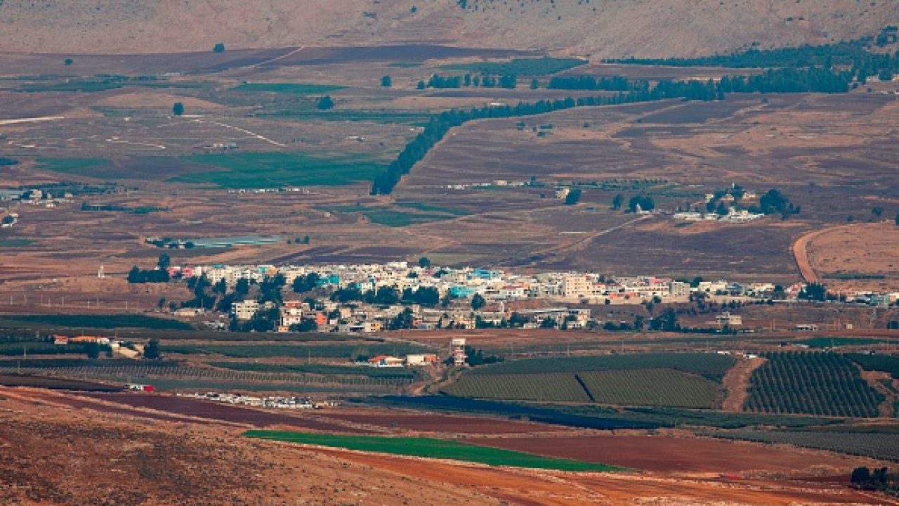 A picture taken on October 30, 2019 shows the divided village of Ghajar, with its northern part falling inside Lebanon and the south becoming part of the Israeli-annexed Golan Heights. - The frontlines have been unchanged for years, but it is the events of recent weeks in Lebanon that, Israel hopes, may weaken its foe Hezbollah, which it regards as a terrorist organisation. (Photo by JALAA MAREY / AFP) (Photo by JALAA MAREY/AFP via Getty Images)