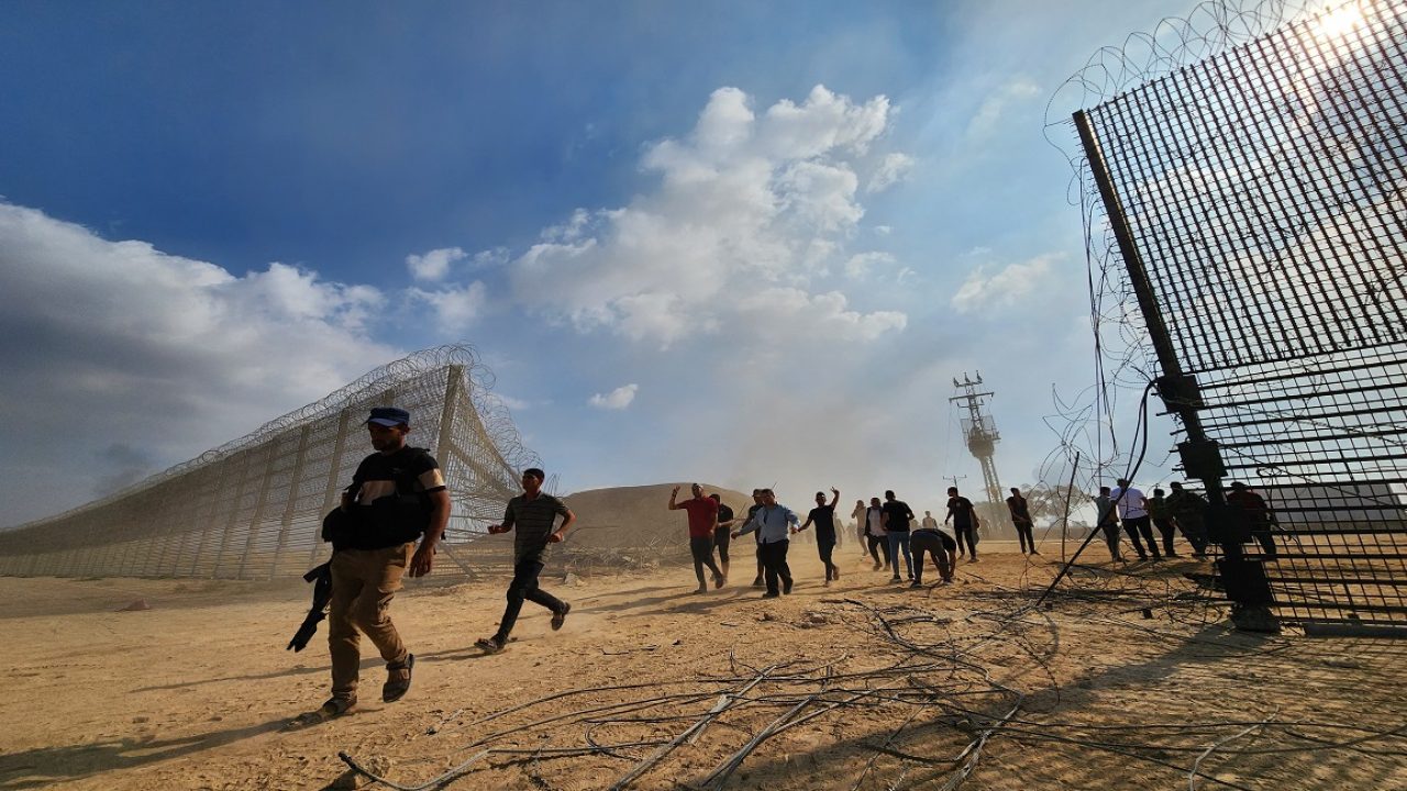 Clashes between Palestinian factions and Israeli forces GAZA CITY, GAZA - OCTOBER 07: Hamas' armed wing, the Izz ad-Din al-Qassam Brigades enter the Israeli side of the fence in Gaza City, Gaza on October 07, 2023. (Photo by Hani Alshaer/Anadolu Agency via Getty Images)