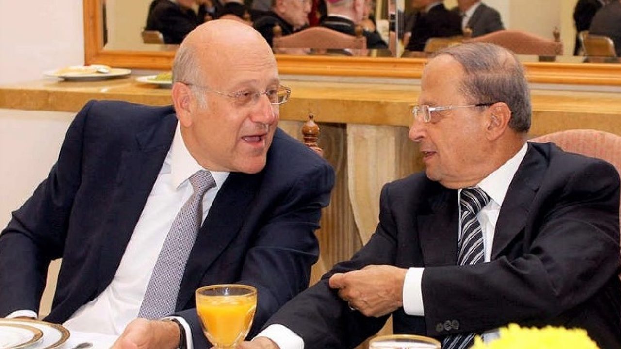 LEBANON-POLITICS A handout picture released by the Lebanese photo agency Dalati and Nohra shows former prime minister Najib Mikati (L) speaking with MP and opposition leader General Michel Aoun during an "iftar" meal at the presidential palace in Baabda on September 9, 2008. Lebanon's political leaders will begin a national dialogue on September 16 in a bid to resolve their political differences, President Michel Sleiman announced today at the meal he hosted for political and religious leaders to break the day's Ramadan fast. AFP PHOTO/HO == RESTRICTED TO EDITORIAL USE ==